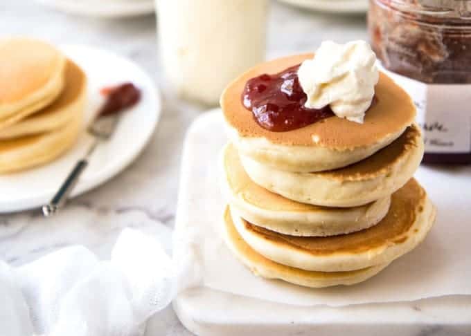 Pikelet with jam and cream.